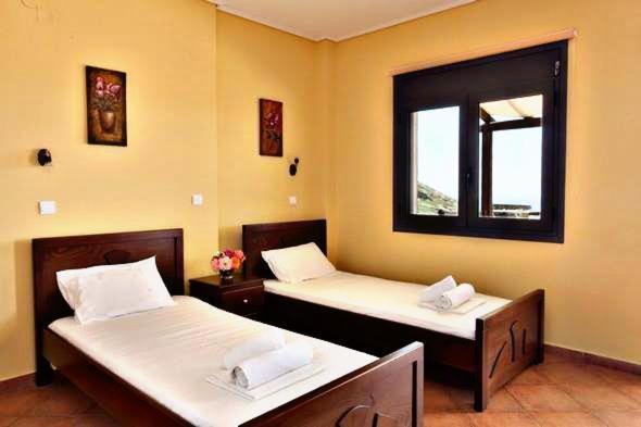 Makronas Apartments Каристос Экстерьер фото